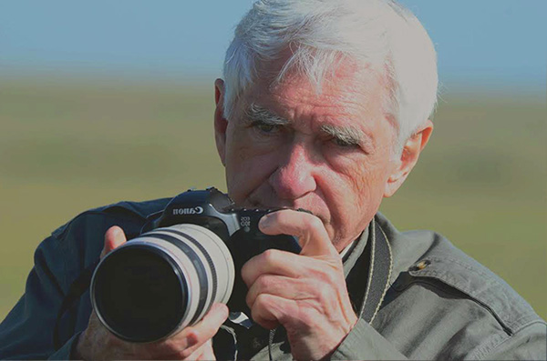 Larry K. Martin photographing on safari